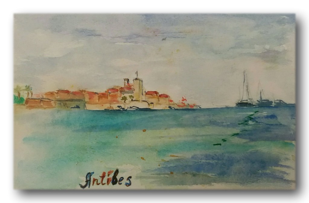 Watercolor painting depicting the coastal town of Antibes in France, showcasing its charming buildings and the sea.